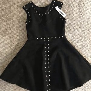 Cheryl kids black suede dress from Denny’s